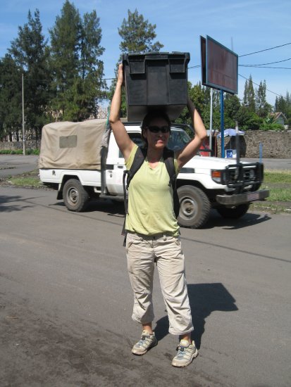 carrying medical supplies African-style