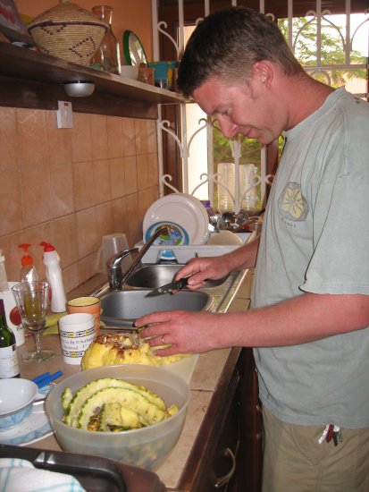 Matt cutting pineapple