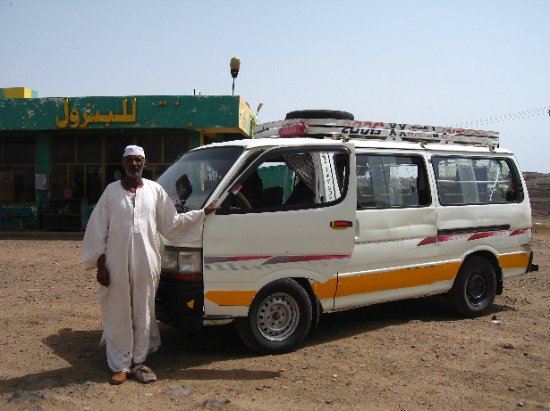 man and his minivan-taxi