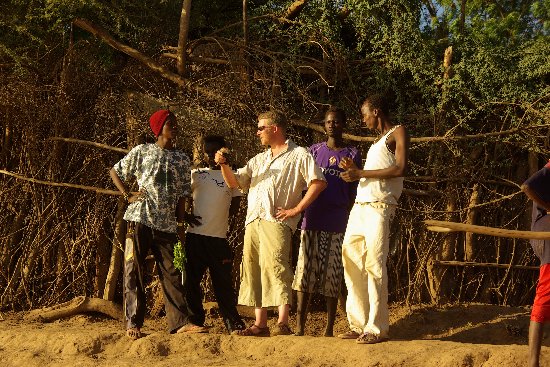 Matt talking with locals