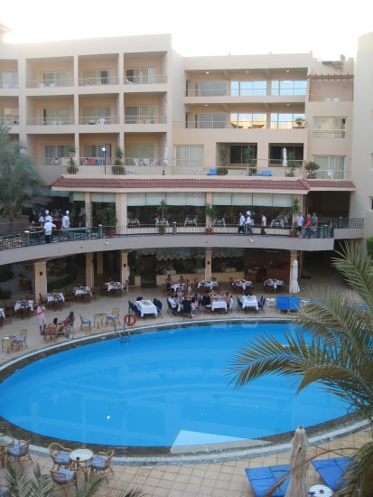 view of pool from balcony