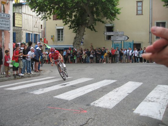 first cyclist to round the corner!