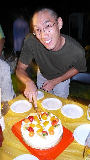 Cal cutting his cake