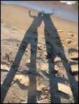 our shadows on Kande Beach