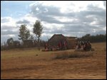 women gathering water at borehole