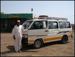 man and his minivan-taxi