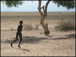 random boy running alongside