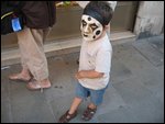 little boy wearing famous Venitian mask